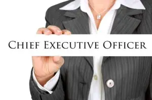 woman holding a CEO sign