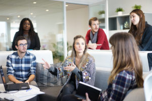 Group of people discussing employee retention