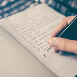 note book with hand writing a list