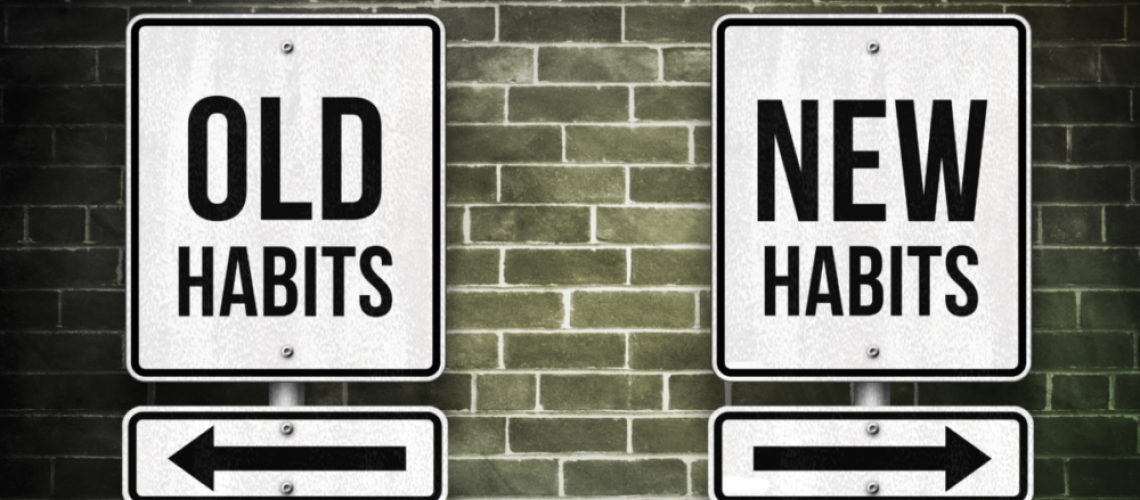 two signs reading old and new habits